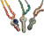 Various Pendant Pipes in an assortment of colors, hanging on a hemp cord.