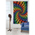 A Dancing Bears Spiral Tapestry hung on a wall.