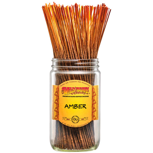 100 Amber-scented Wild Berry Traditional Incense Sticks in a labeled jar on a white background with their signature orange-colored sticks sticking out at the top.
