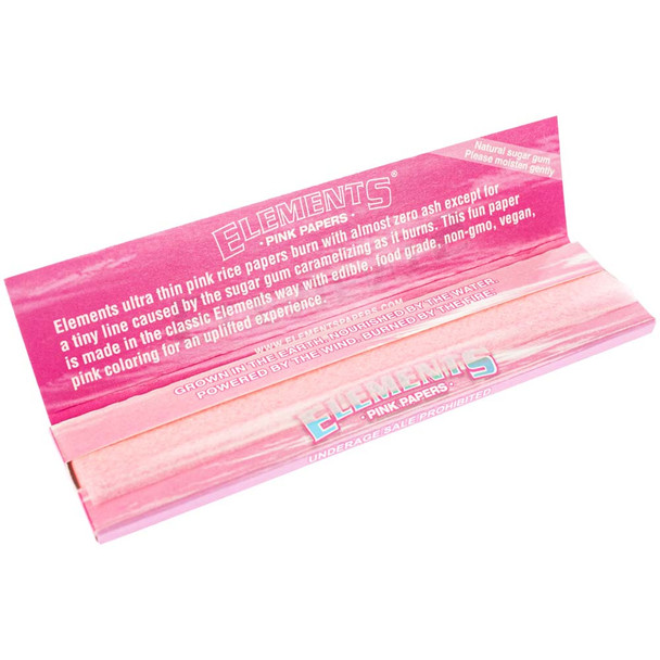 An open pack of Elements pink papers revealing a sheet of pink paper.