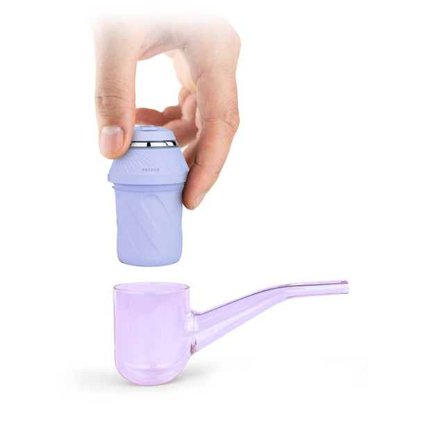 Proxy Base Unit in the new Bloom colorway being lifted from its glass pipe housing.