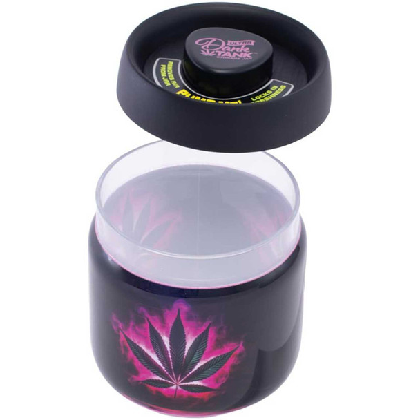 Fujima Dank Tank Neon Flame Leaf Vacuum Jar photographed from a high angle with the lid removed and positioned beside the jar, showing open storage area