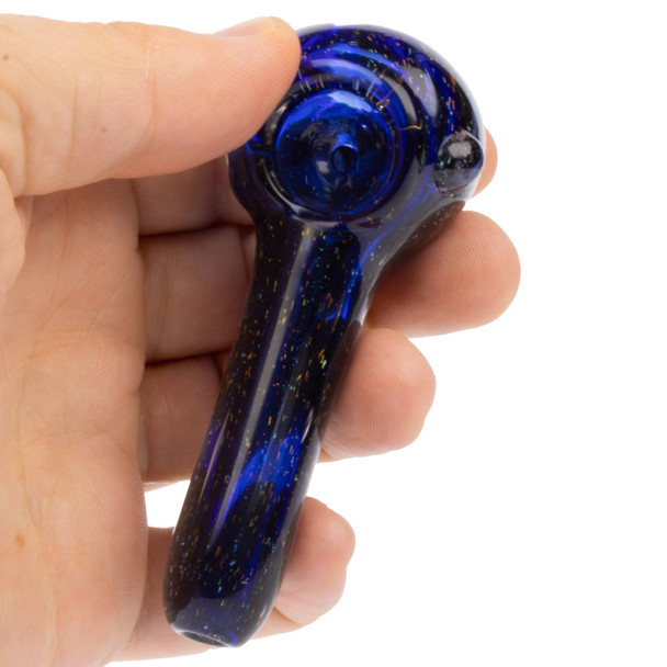 Hand holding Glass Headz! 3.5" dichroic spoon pipe for size reference