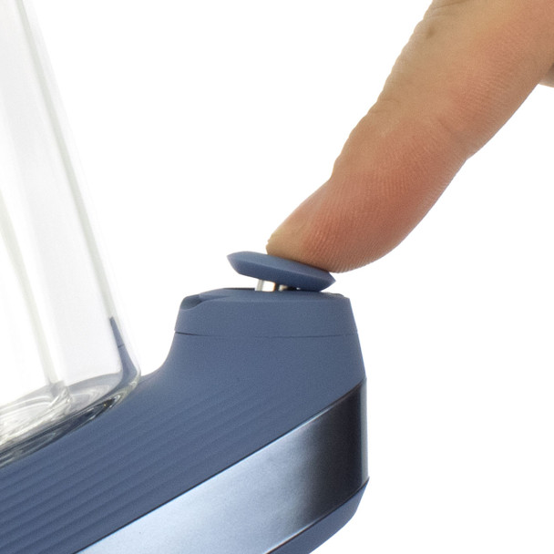 Finger manipulating the Puffco Peak Sapphire's joystick carb cap.