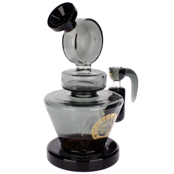 Nothing's Impossible 8-inch black glass water pipe with matching Flying Pig hook bowl, smoke gray borosilicate glass, and sturdy wide base, side view.