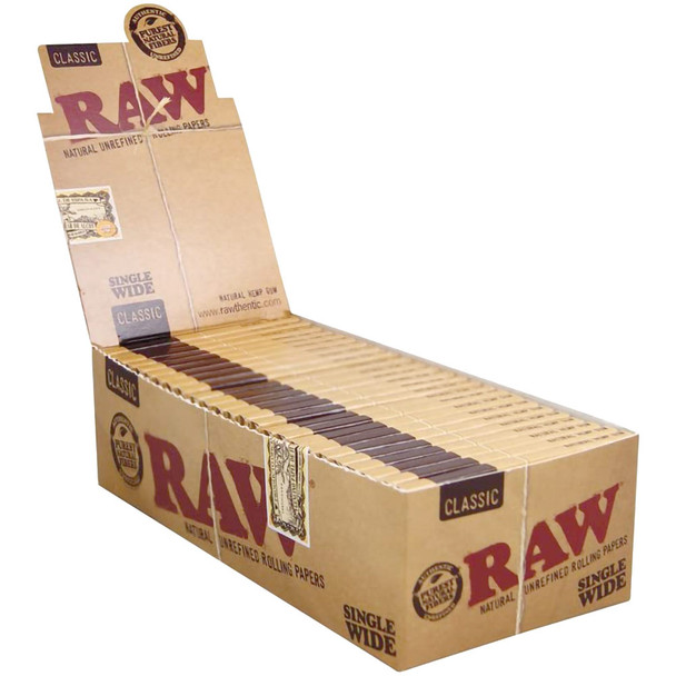 An open display box filled with Raw Single Wide paper booklets.
