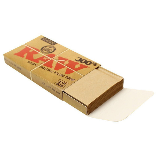 An open pack of Raw 300's Classic 1 1/4 Rolling Papers.