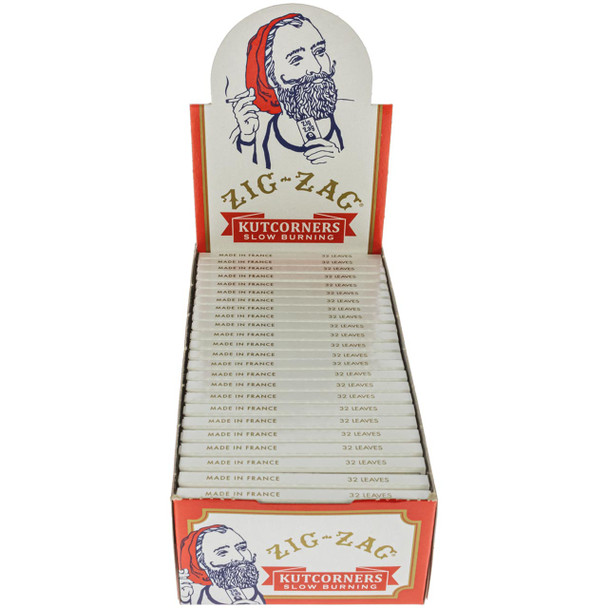 An open display box containing 24 booklets of Kutcorners rolling papers.