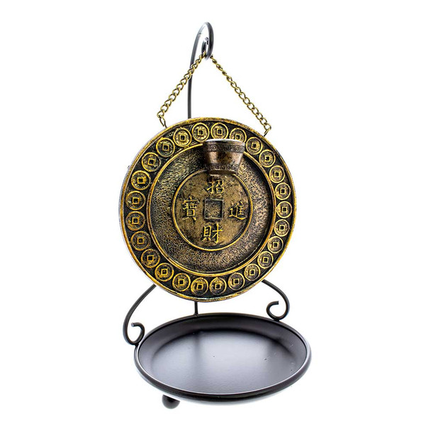 The back of this piece is adorned with traditional markings of Asian coins, and the golden coloring is a set piece of Feng Shui-style decor.