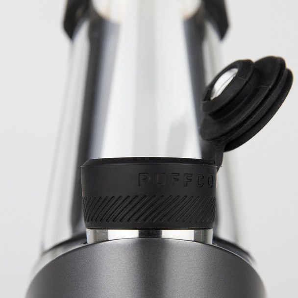 Close view of an Oculus Carb Cap included with the Peak Pro Travel Pack on a Puffco Peak Pro.