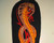 Orange and red tribal cobra