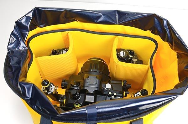 Reinforced base and padded walls protect housings and ports