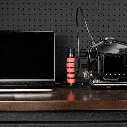 Ikelite vacuum-pump valve and USB-C bulkhead on housing