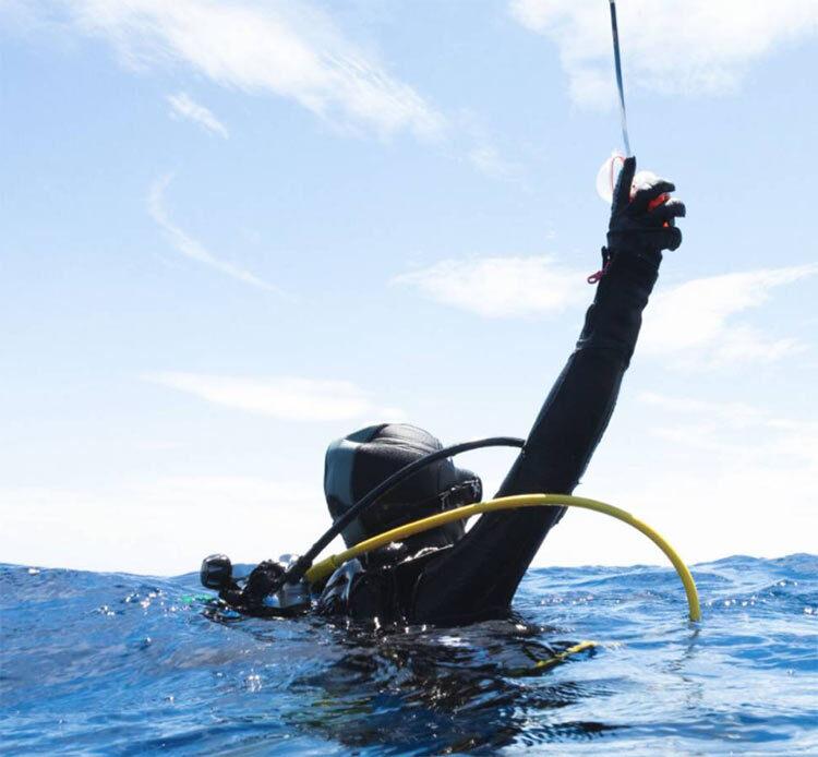 Phone programming the beacon via optical light for MMSI region setup