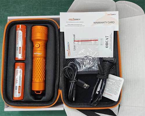 OrcaTorch Orca7 dive light with 21700 USB-C rechargeable battery and charging port detail