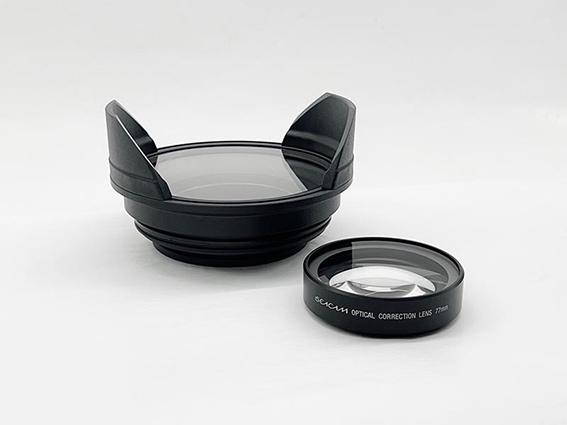 Correction lens and port extension for SEACAM Optical Precision Port system