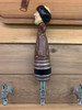 side view of monk bobble head beer tap handle