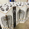 Triangle shape tap handle with custom print.