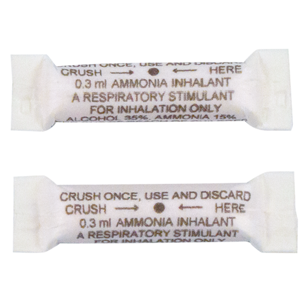 Two individual paper-wrapped 0.3 ml ammonia inhalant crushable ampoules displayed on a black background, showing printed directions reading "Crush Once, Use and Discard".