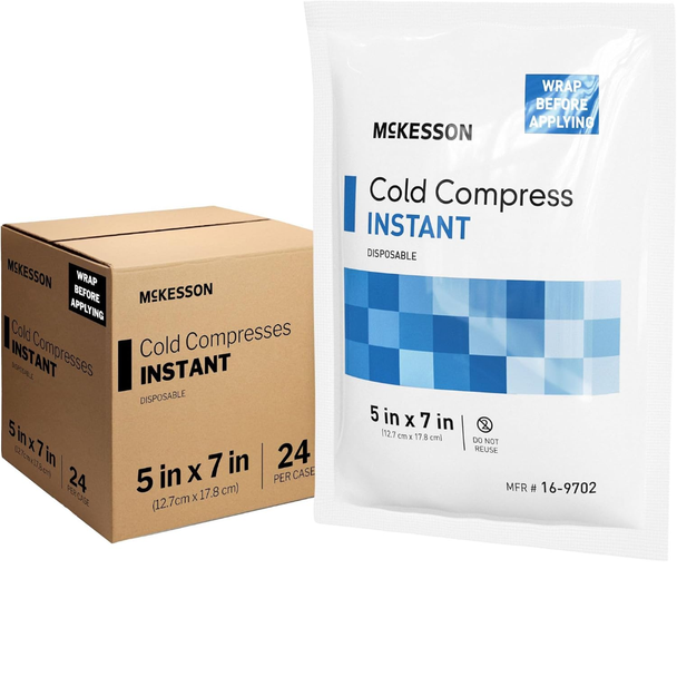 Front view of a 5x7 inch McKesson Instant Cold Compress disposable ice pack next to its bulk shipping box.