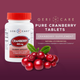 Geri-Care Cranberry tablets bottle displayed next to fresh red cranberries, highlighting the natural fruit ingredients.