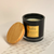 Makana Confections Chocolate hand poured soy candles in a black glass jar and wooden lid