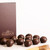 Makana Confections Bourbon Truffles gift box with handmade dark chocolate truffles.