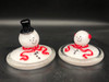 Hand blown glass melted snowman (Snow"lady")  with earmuffs & scarf.  shown here on right; Playful and fun.  Best paired with her snow"hubby", shown here on the left ;)