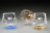 handblown Crackle Thumblers are hand-sculpted, no mold. Crackle appearance/texture and thumb/finger depressions for a "no slip grip"!  These fun to hold, and drink from glasses are approximately 3 X 3 inches. Currently offered in "Summer Seas" (blues, little white and green), shown on left, and Fall Foliage (amber/orange/red blend), center and right. Please specify color preference in Order Notes and/or contact me with any questions.