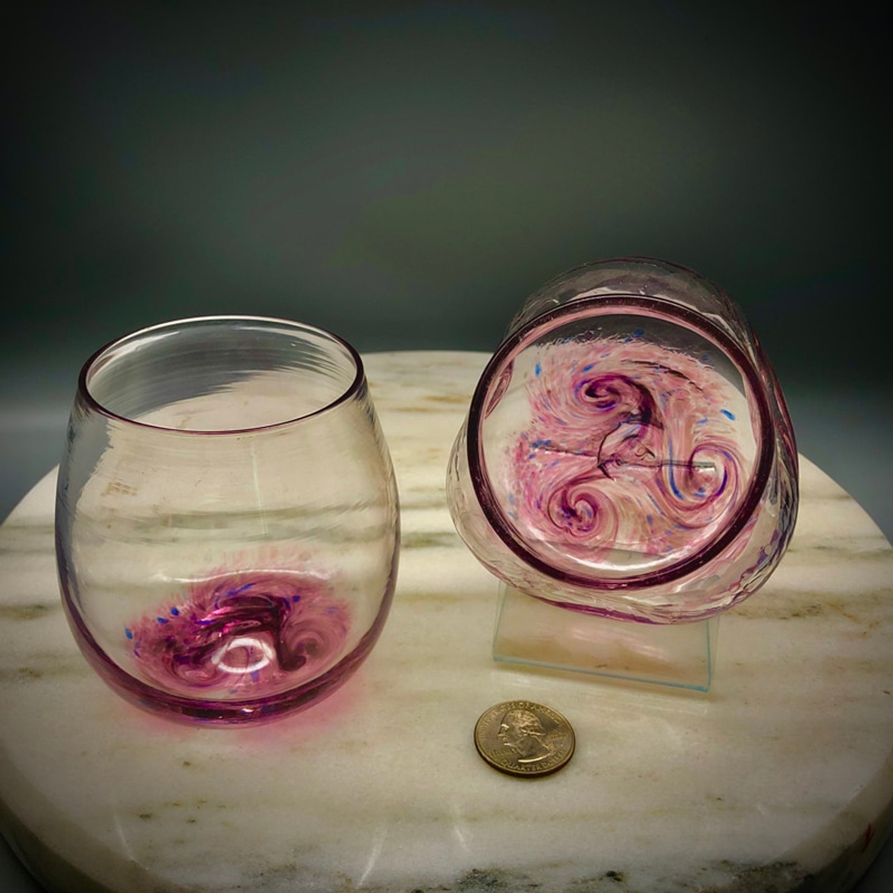 https://cdn11.bigcommerce.com/s-1ogawmc/images/stencil/1280x1280/products/125/539/burgundy-swirl-stemless-wine-glasses-i-bc-web__67387.1598498653.jpg?c=2