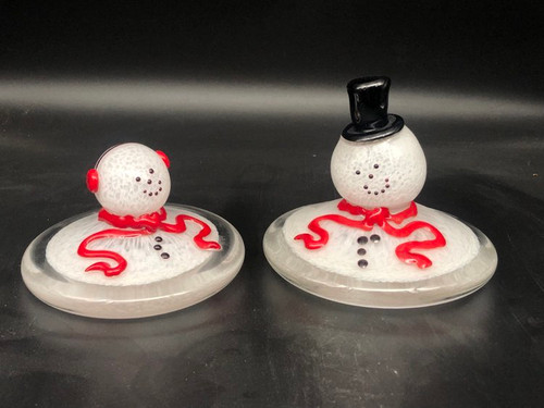 Hand blown glass melted snowman (Snow"lady")  with earmuffs & scarf.  shown here on left; Playful and fun.  Best paired with her snow"hubby", shown here on the right ;)
