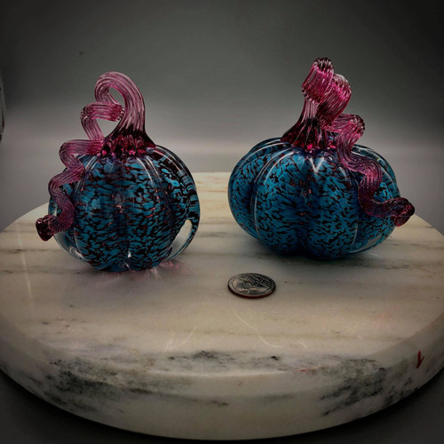 gorgeous and colorful hand-sculpted Teal over Ruby solid glass pumpkins, with Gold Ruby optic stem, handmade by glassblower Chris Sherwin in his Bellows Falls , Vermont studio. available in two sizes: Small (3" +-) and Medium 4" (+-)