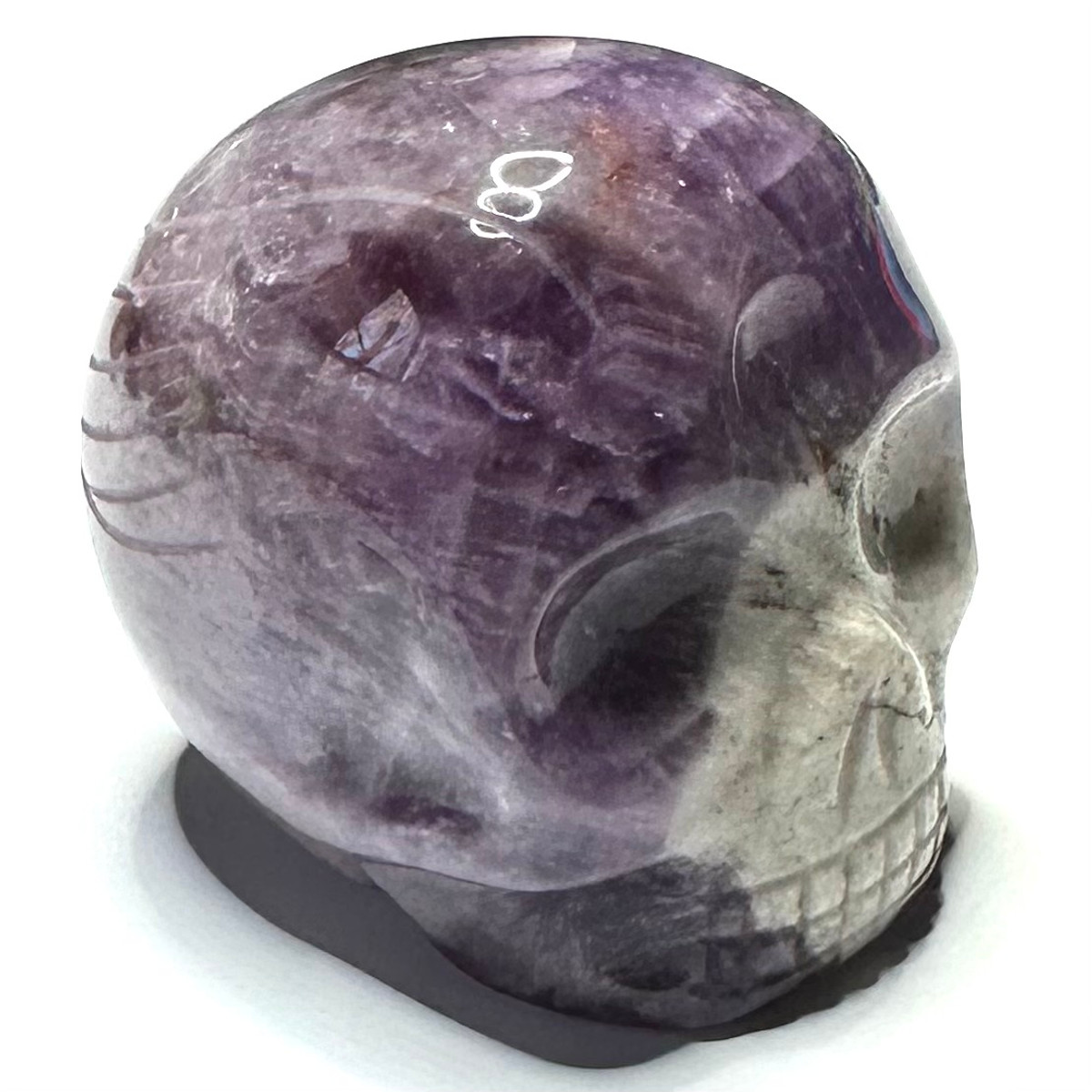 RARE-One of a Kind Vanderlei Barreto Carved  Amethyst with Rainbow Inclusions Skull-1 1/2 x 1 3/4"