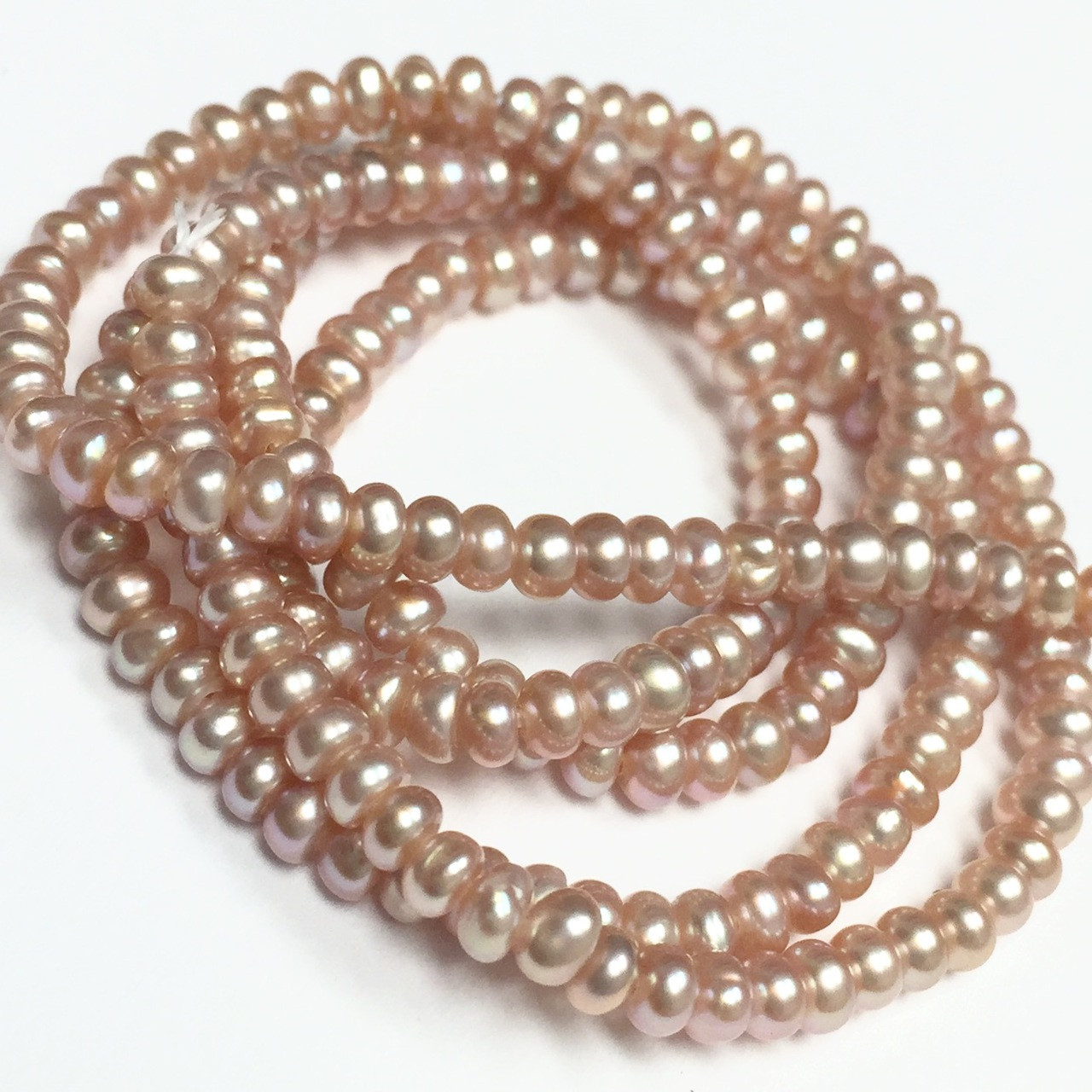 Tiny Pink Button Freshwater Pearl Beads - A Grain of Sand