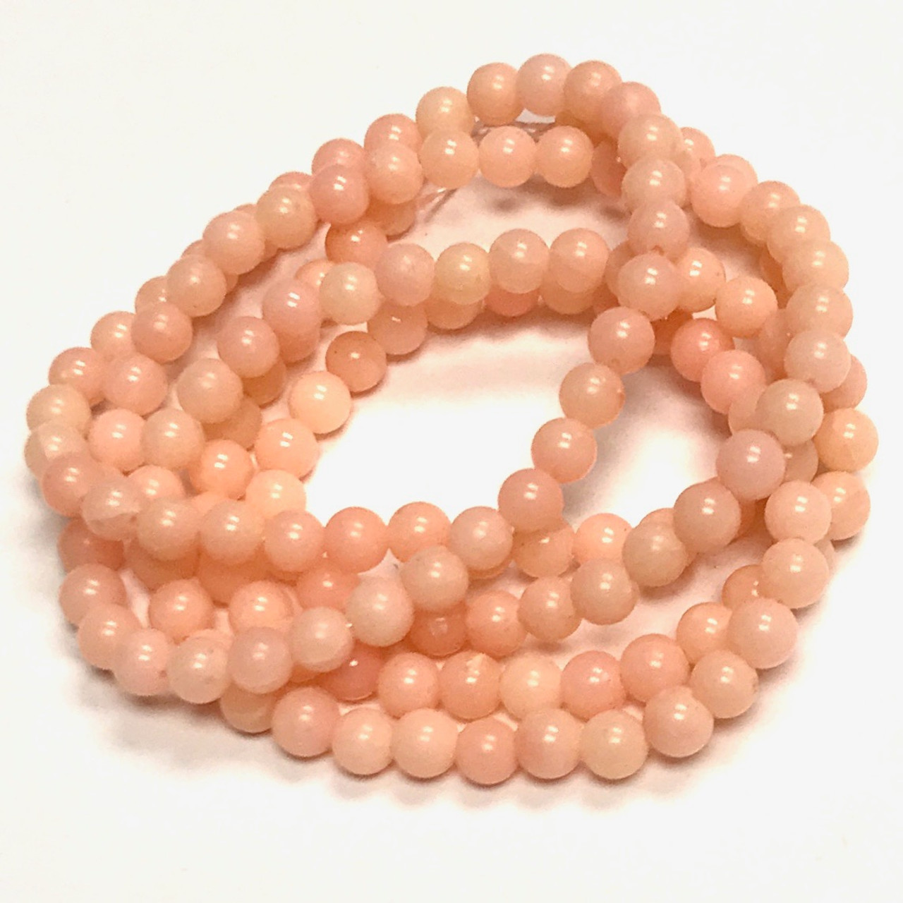 Pink Bamboo Coral Smooth Round Beads