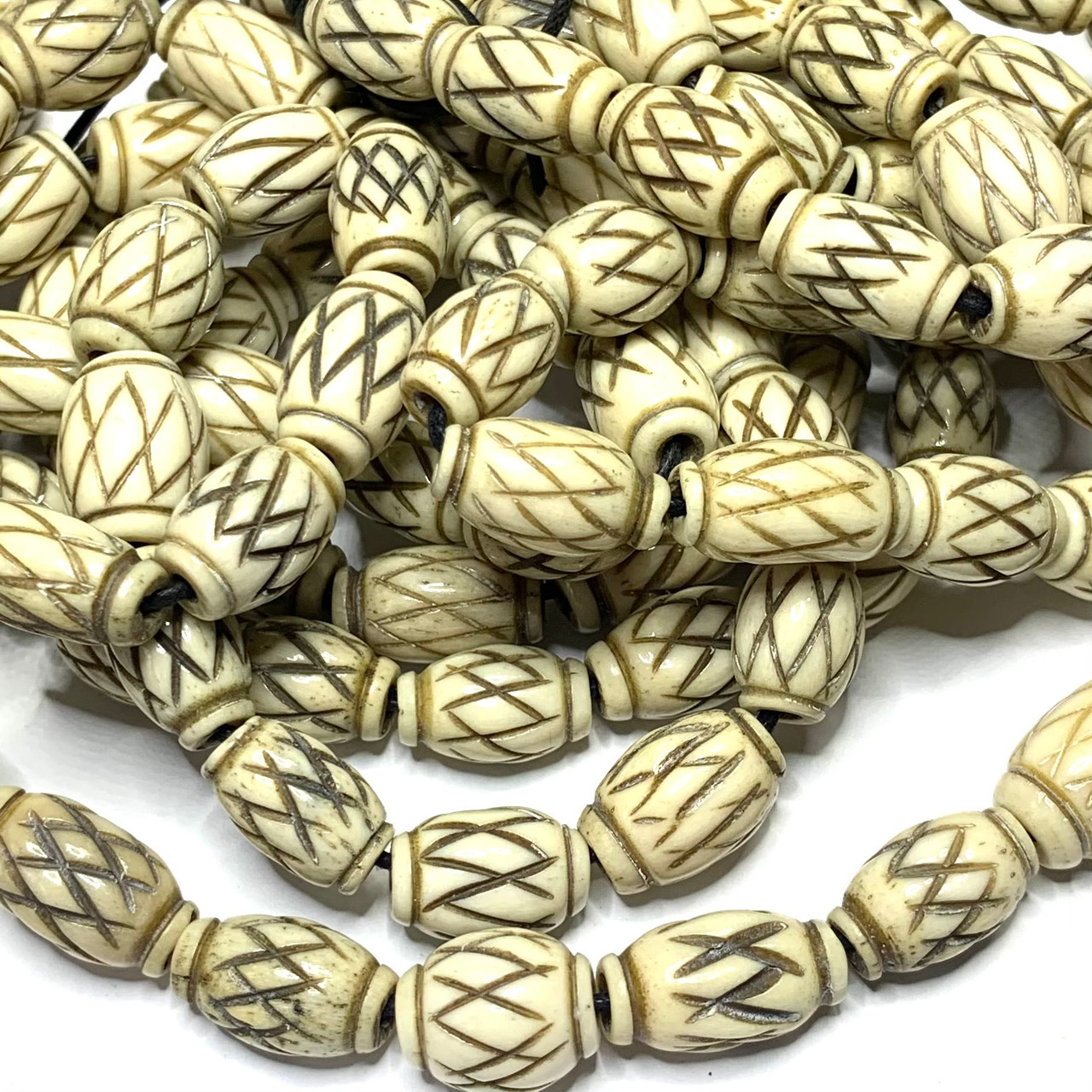 Hand Carved Vintage Bone Beads Assorted size skulls 15 pieces