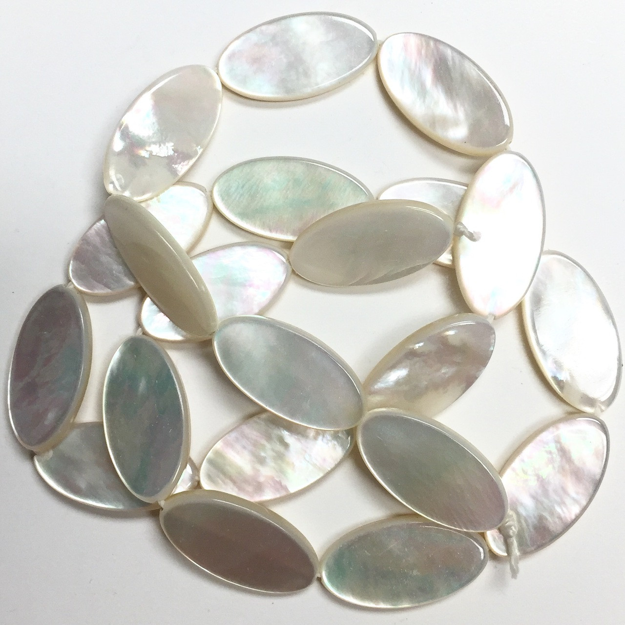 Lustrous MOP Flat Oval Beads - A Grain of Sand