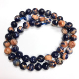 A Grade Orange Sodalite Highly Polished Round Beads