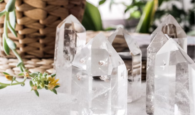 Several crystals laid out on a clothed table