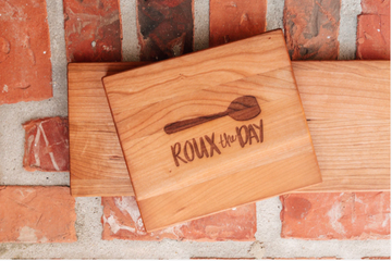 Roux The Day Cutting Board