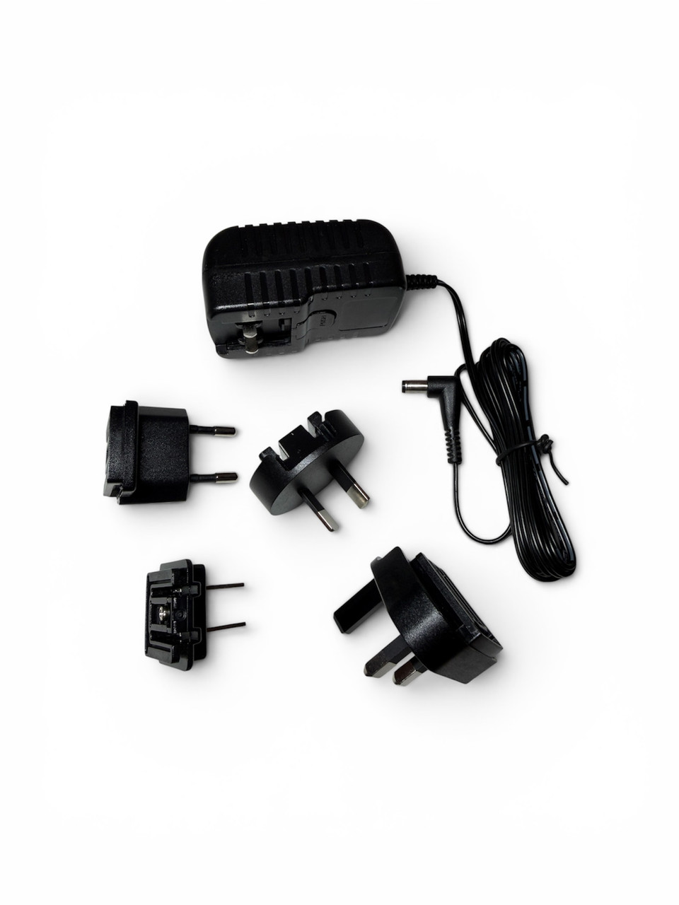 AC/DC Power Adapter Part Number 9V-1500mA 90 DEG INTL 1000512920