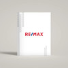 RE/MAX White Dawn hardcover presentation cover – portrait view showing full front design with soft matte finish
