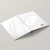 Keller Williams 'White Nautilus" hardcover presentation cover – lay-flat binding with backside view of soft-touch finish and branded design
