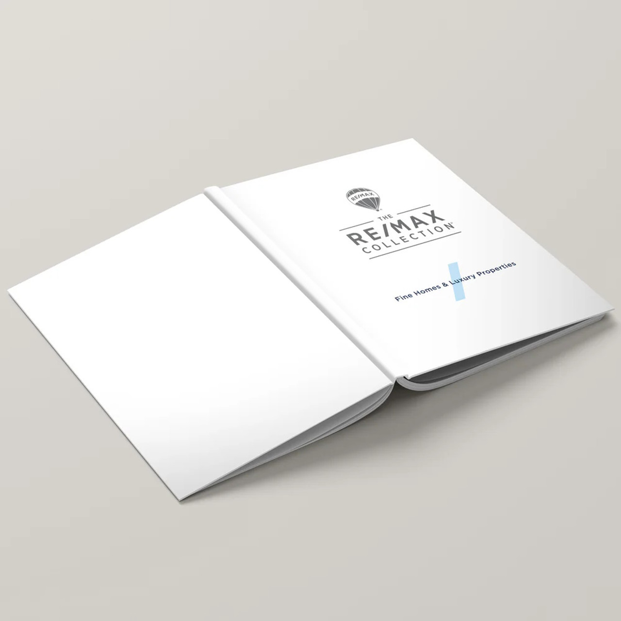 The RE/MAX Collection hardcover presentation cover – lay-flat binding with backside view of soft-touch finish and branded design
