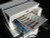 Virtual Labels Label Printing System printing color-coded filing labels on a sheet