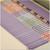 Open file drawer filled with lavender end tab folders organized with color-coded labels.