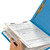Hand placing documents into a blue classification folder with two manila dividers and fasteners for subdivided filing.