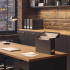 Smead FlipTop File Box, Charcoal Linen, letter size, open on a desk with gold nameplate in a modern office