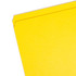 Close-up of the top corner and reinforced straight-cut end tab on a yellow Smead file folder.