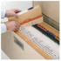 Hands placing an out guide into a drawer of straight-line color-coded file folders.